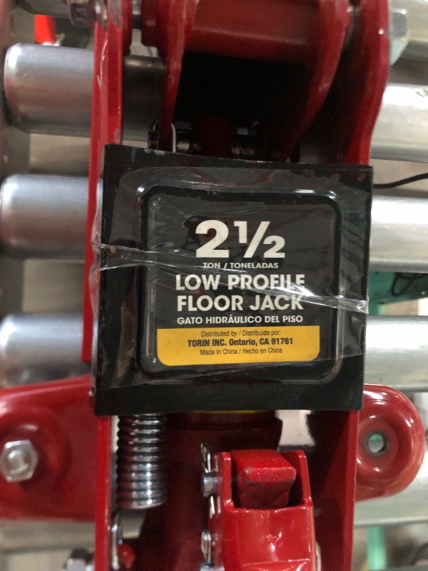 Photo 2 of *MISSING WHEELS/PUMP STICK** *red 2 1/2 ton low profile floor jack