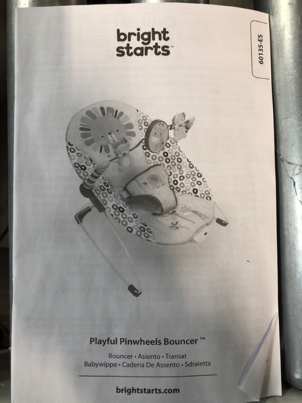 Photo 1 of Bright Starts Playful Pinwheels Portable Baby Bouncer