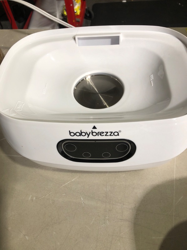 Photo 2 of Baby Brezza Baby Bottle Sterilizer and Dryer Advanced – Electric Steam Sterilization Machine – Universal Sterilizing for All Bottles: Plastic + Glass + Pacifiers + Breast Pump Parts - HEPA Filtration