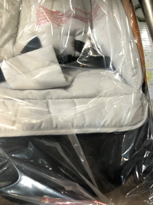 Photo 1 of Dream on Me Rock with me 2-in-1 Rocker and Stationary Seat | Compact Portable Infant Rocker with Removable Toys Bar & Hanging Toys in Black & Grey