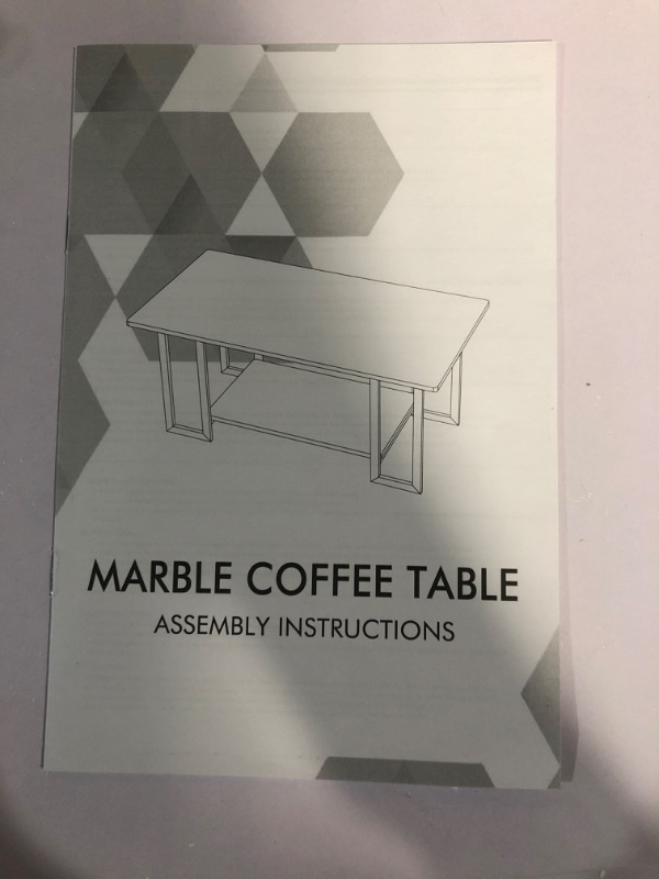 Photo 1 of **MISSING PIECES** AWQM Marble Coffee Table