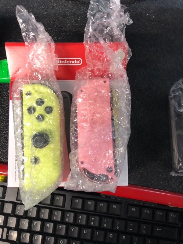 Photo 2 of Nintendo switch controllers