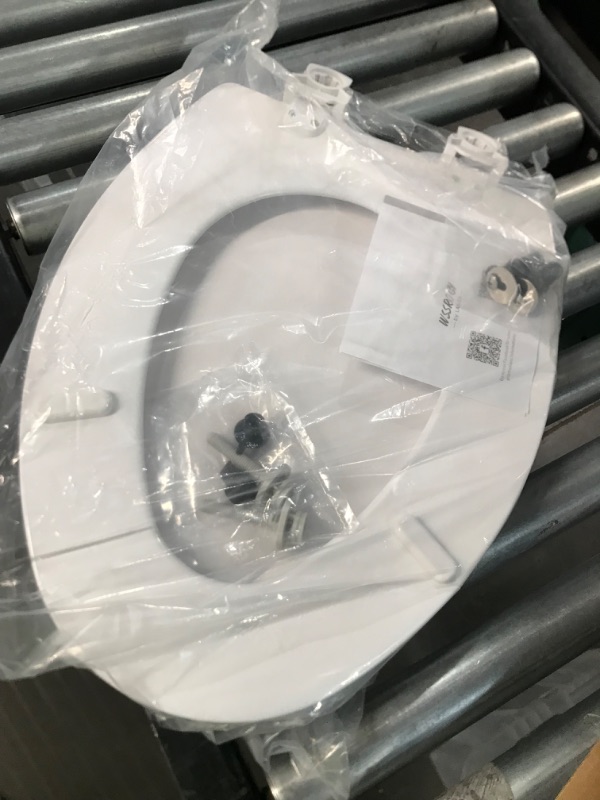 Photo 2 of ***LIKE NEW*** WSSROGY Elongated Toilet Seat with Lid, Quiet Close, Fits Standard Elongated or Oblong Toilets, Slow Close Seat and Cover, Oval, White