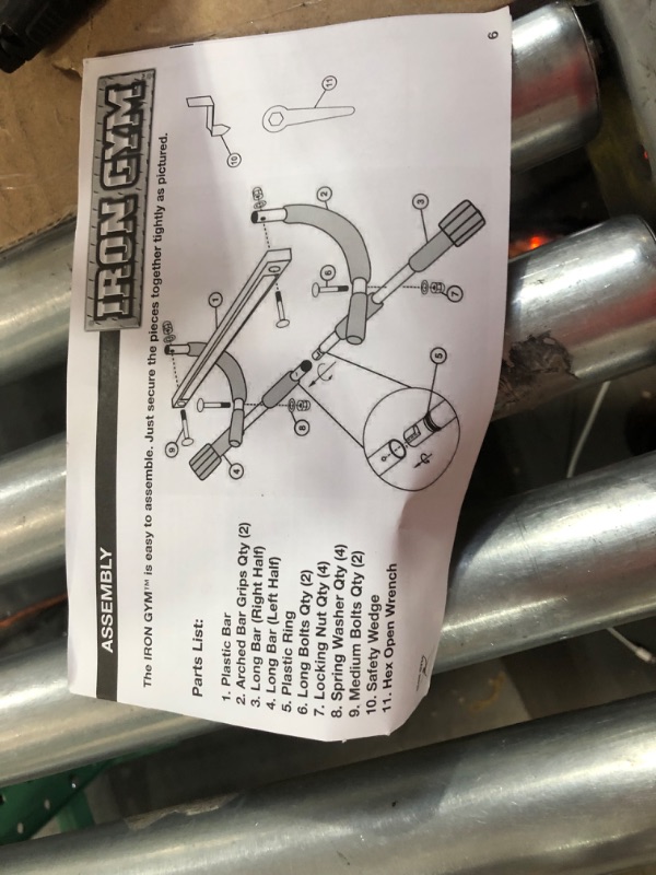 Photo 2 of *Loose Hardware* Iron Gym Total Upper Body Workout Bar for Doorway, Adjustable Width Locking