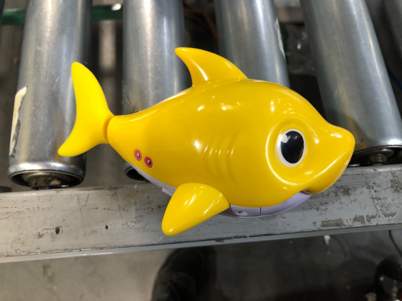 Photo 2 of Robo Alive Junior Baby Shark Battery-Powered Sing and Swim Bath Toy by ZURU - (Yellow)