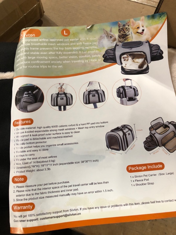 Photo 4 of **tear on the top panel**
Siivton 4 Sides Expandable Pet Carrier, Airline Approved Soft-Sided Dog Cat Carrier Bag