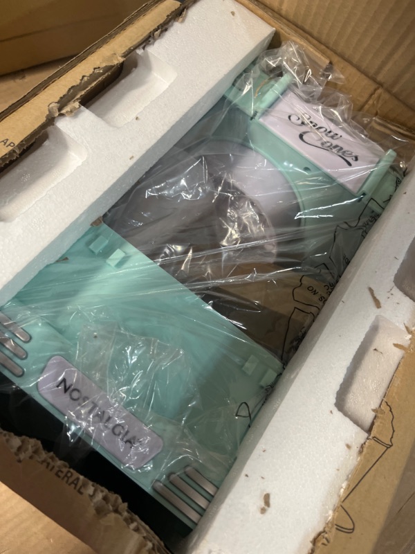 Photo 1 of Nostalgia NRSCM602CB6A Countertop Snow Cone Maker Makes 20 Icy Treats, Includes 2 Reusable Plastic Cups & Ice Scoop Baby Blue Cone Maker