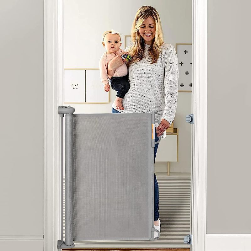 Photo 1 of *SEE NOTES* Momcozy Retractable Baby Gate, 33" Tall, Extends up to 55" Wide, Child Safety Baby Gates