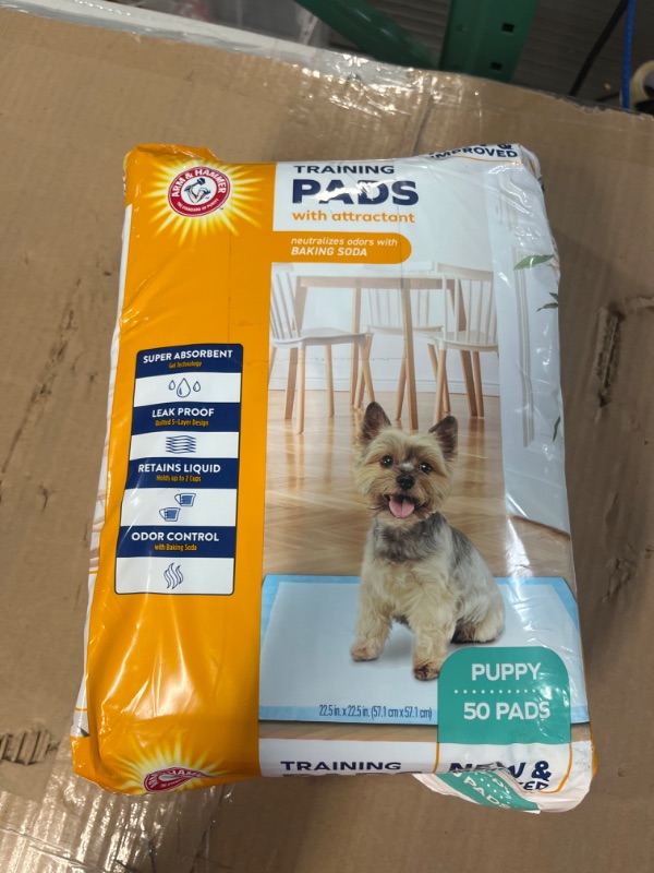 Photo 2 of Arm & Hammer for Dogs Puppy Training Pads with Attractant | New & Improved Super Absorbent, Leak-Proof, Odor Control Quilted Puppy Pads with Baking Soda| 50 Count Wee Wee Pads Pads With Attractant - 22.5" x 22.5" 50 Count