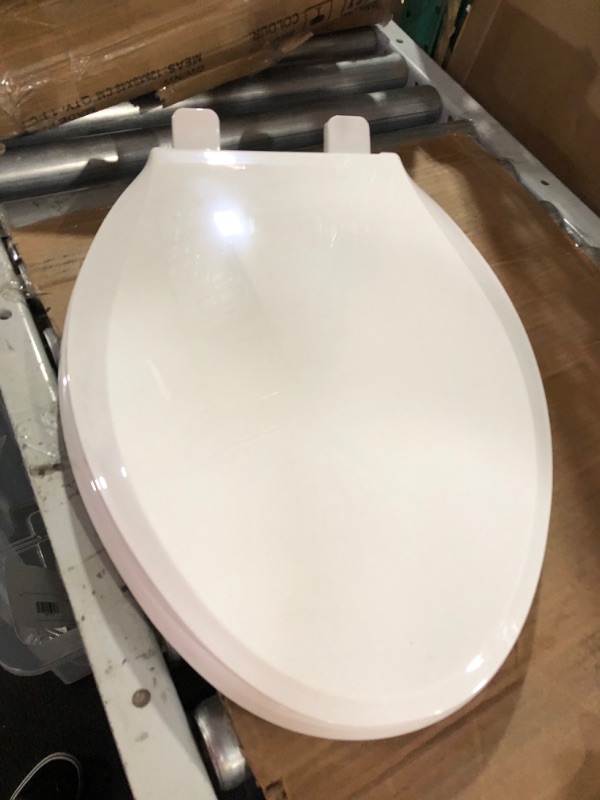 Photo 2 of  Elongated Plastic Toilet Seat, Standard Economy Model, White