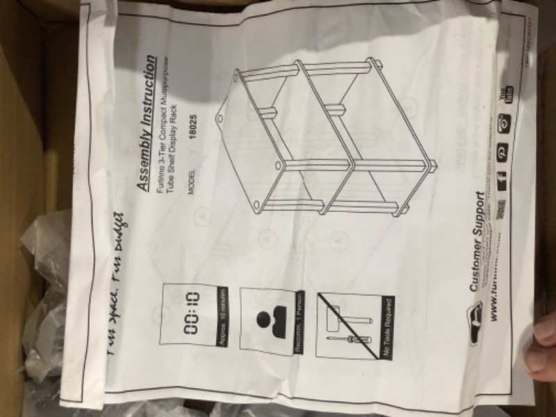 Photo 3 of **item defective**legs lacking connecting ends**
Furinno Turn-S-Tube 3-Tier Compact Multipurpose Shelf Display Rack Black/Grey