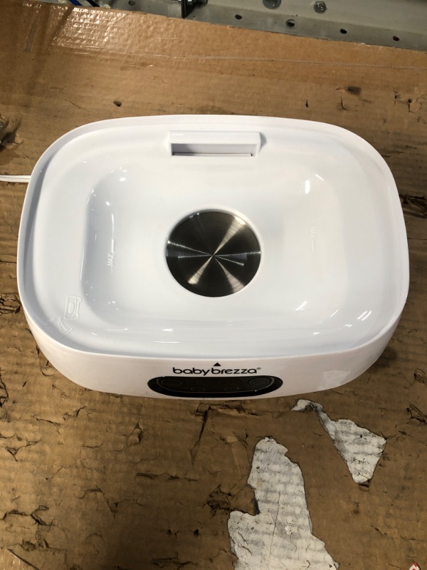 Photo 1 of item missing top part see pictures***
Baby Brezza Baby Bottle Sterilizer and Dryer Machine – Electric Steam Sterilization - 