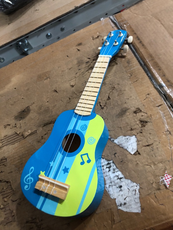 Photo 2 of BROKEN STRING Hape Kid's Wooden Toy Ukulele in Blue, L: 21.9, W: 8.1, H: 3 inch