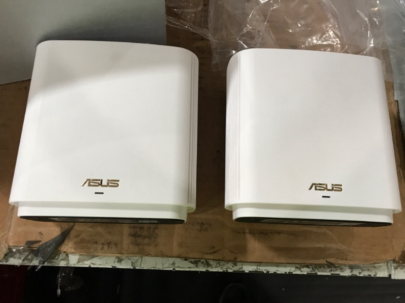 Photo 2 of **ONE DOESN'T CONNECT**
ASUS ZenWiFi AX6600 Tri-Band Mesh WiFi 6 System (XT8 2PK) 
