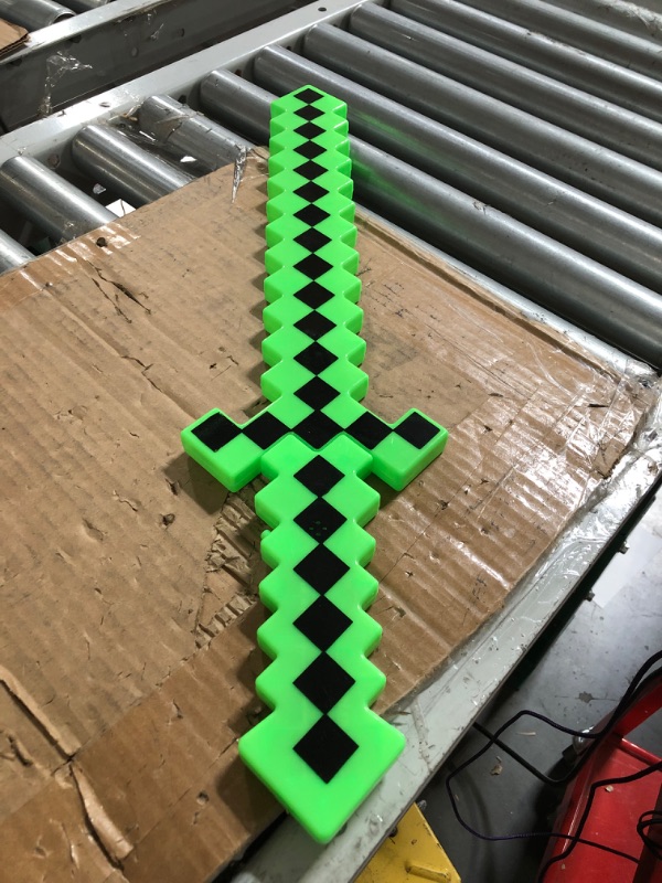 Photo 2 of Fun Central LED Light Up Pixel 8-Bit Toy Sword for Kids - Green