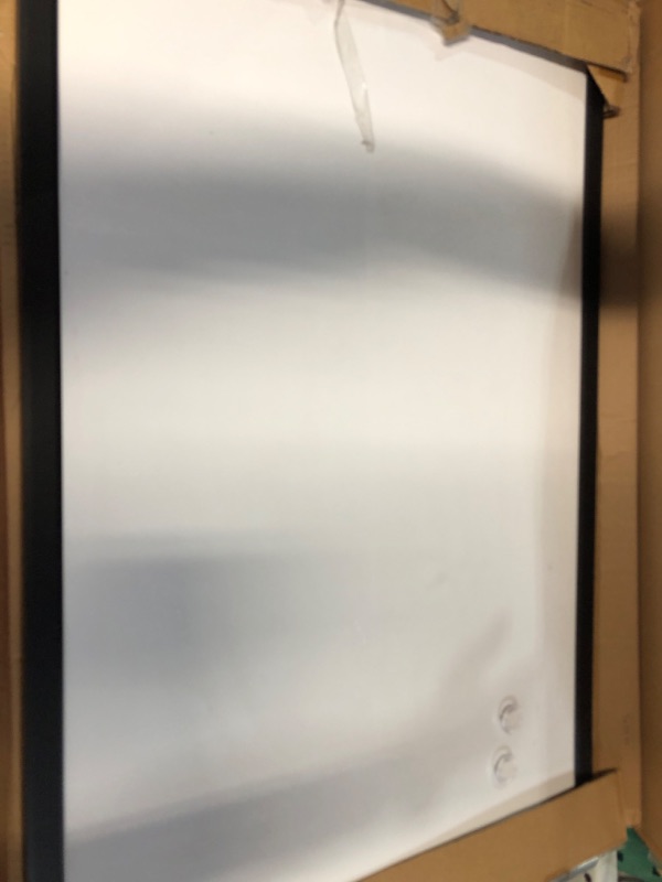 Photo 2 of *Used* Amazon Basics Magnetic Dry Erase White Board, 35 x 23-Inch Whiteboard - Black Wooden Frame 23"x35" Magnetic, Wood Frame