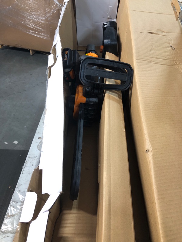 Photo 2 of ** Used** Worx 20V 10 Auto Tension Electric Cordless Pole Chainsaw with Battery Charger