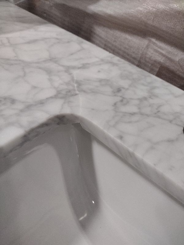 Photo 5 of **CORNER DAMAGE**
Stockham 49 in. W x 22 in. D Bath Vanity in Chilled Gray with Marble Vanity Top in Carrara White with White Basin
