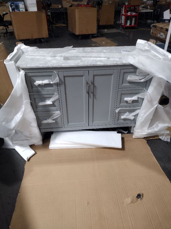 Photo 13 of **CORNER DAMAGE**
Stockham 49 in. W x 22 in. D Bath Vanity in Chilled Gray with Marble Vanity Top in Carrara White with White Basin
