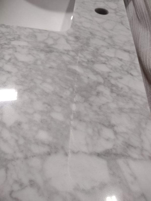 Photo 8 of **CORNER DAMAGE**
Stockham 49 in. W x 22 in. D Bath Vanity in Chilled Gray with Marble Vanity Top in Carrara White with White Basin
