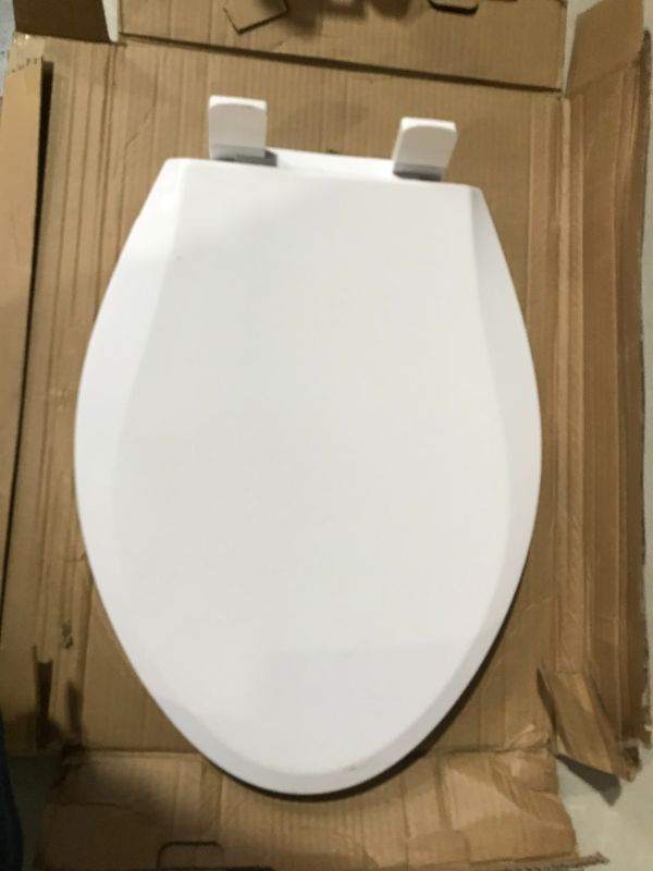 Photo 2 of ***DAMAGED - SEE NOTES***
CCBELLA Toilet Seat with Toddler Seat Built in, 16.5" Round