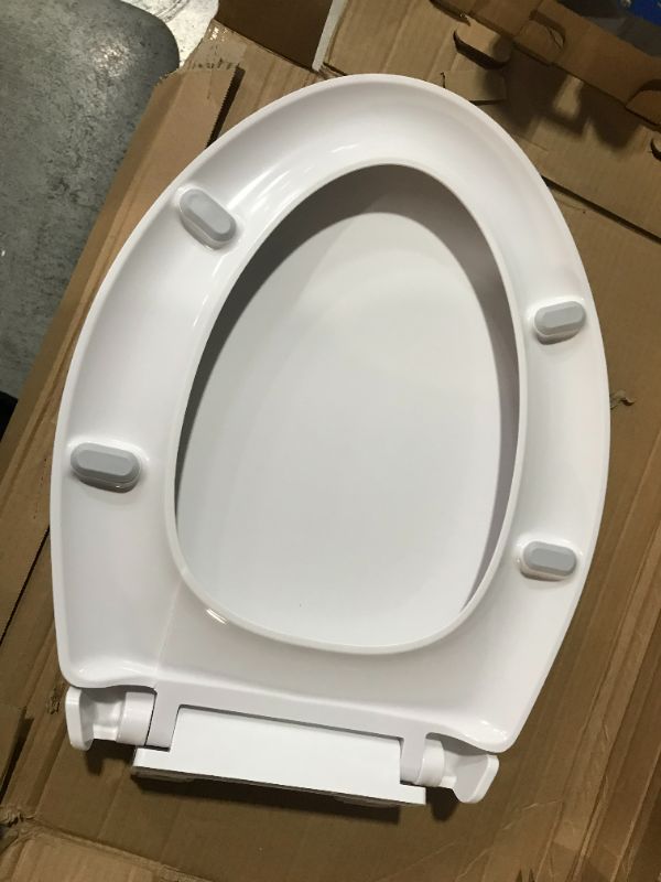 Photo 4 of ***DAMAGED - SEE NOTES***
CCBELLA Toilet Seat with Toddler Seat Built in, 16.5" Round