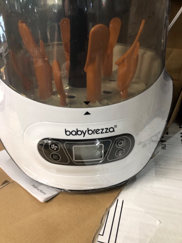 Photo 1 of Baby Brezza Baby Bottle Sterilizer and Dryer Machine – Electric Steam Sterilization - Universal Fit - Pacifiers, Glass, Plastic, and Newborn Feeding Bottles