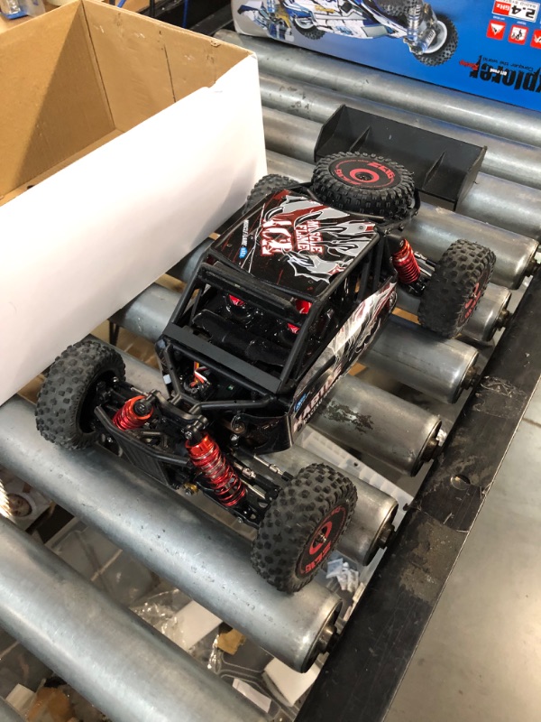 Photo 11 of GoolRC WLtoys, 1:12 Scale Remote Control Car, 4WD 75km/h, 2.4GHz, Off Road RC Truck RTR with Brushless Motor and Metal Chassis