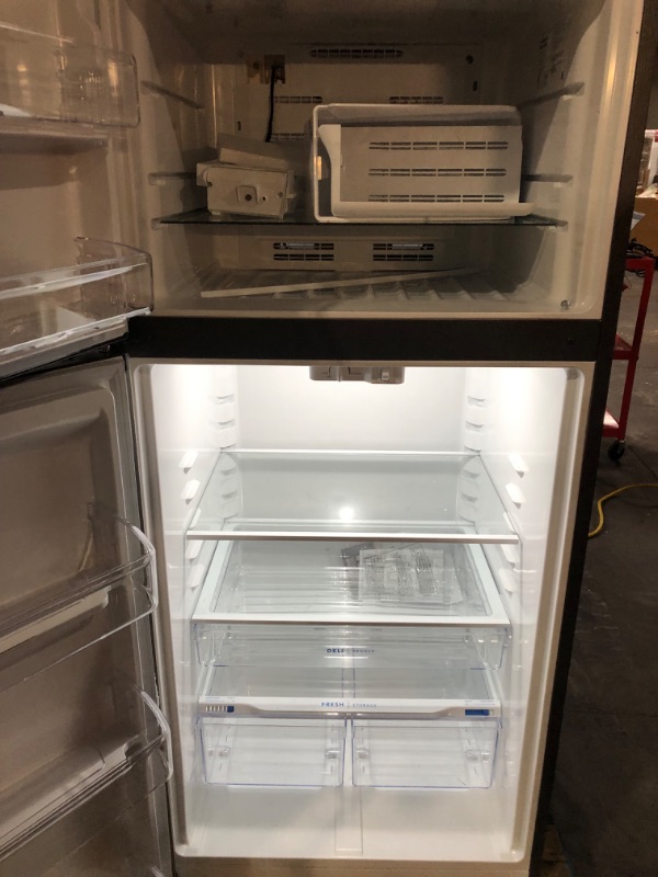 Photo 3 of **TESTED** SEE PICTURESFrigidaire Garage-Ready 20-cu ft Top-Freezer Refrigerator (Fingerprint Resistant Stainless Steel)
