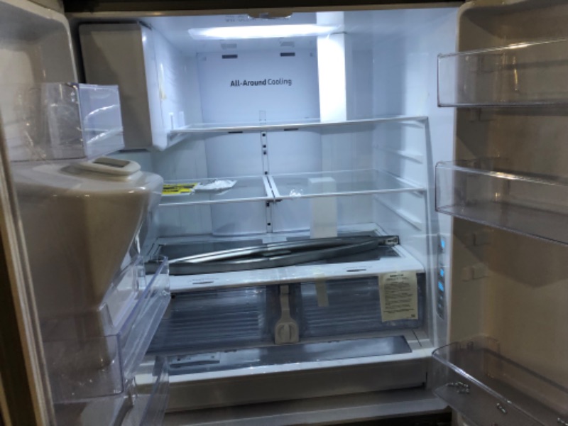 Photo 3 of 27 cu. ft. Large Capacity 3-Door French Door Refrigerator with Dual Ice Maker in Stainless Steel SAMSUNG
TESTED POWERS ON