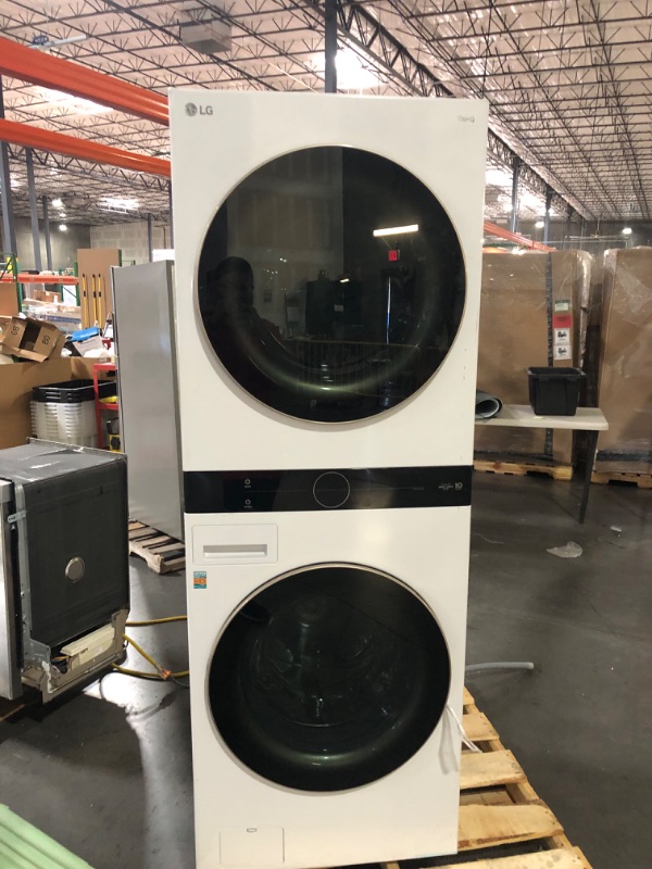 Photo 1 of **READ NOTES**  LG WashTower Stacked SMART Laundry Center 4.5 Cu.Ft. Front Load Washer & 7.4 Cu.Ft. Electric Dryer in White TESTED LIKE NEW