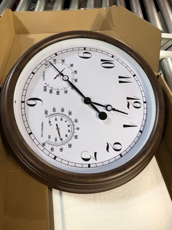 Photo 1 of brown clock 