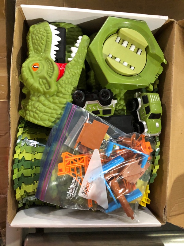 Photo 1 of Dinosaur Race Car Track Toys