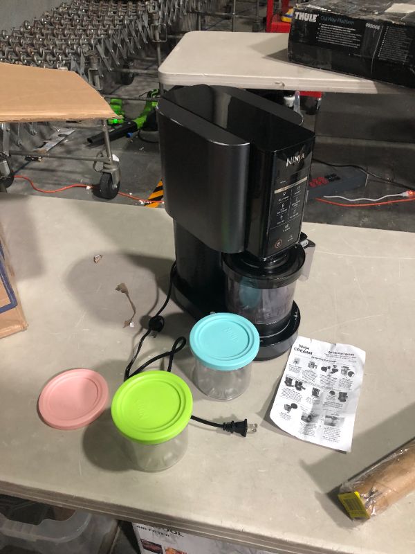 Photo 2 of **PARTS ONLY, NON-FUNCTIONAL** Ninja NC301 CREAMi, Ice Cream, Gelato, Milkshake, Sorbet, and Smoothie Bowl Maker, 7 One-Touch Programs, Silver