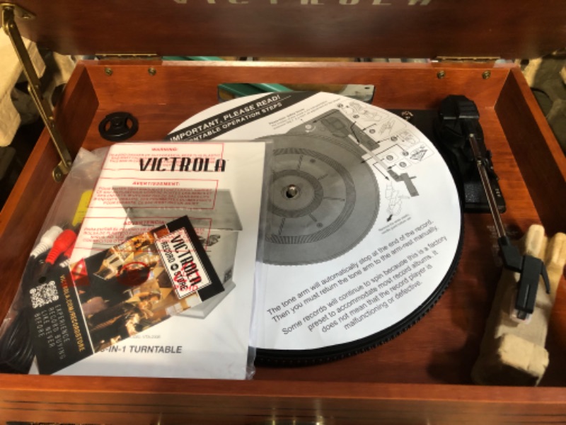 Photo 4 of **USED BUT APPEARS NEW** Victrola Nostalgic 6-in-1 Bluetooth Record Player & Multimedia Center with Built-in Speakers - 3-Speed Turntable, CD & Cassette Player, FM Radio | Wireless Music Streaming | Mahogany Mahogany Entertainment Center