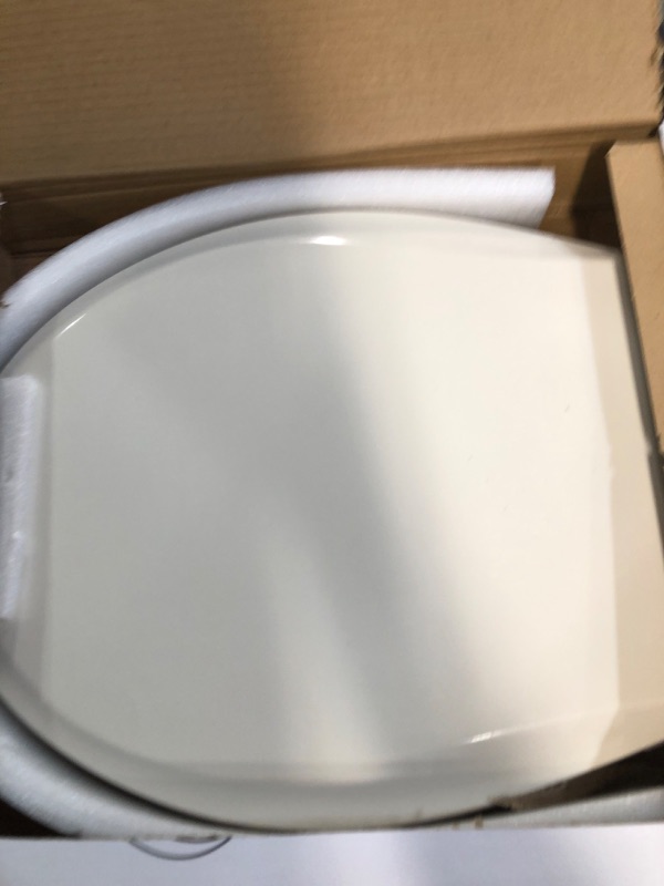 Photo 2 of **MISSING HARDWARE AND INSTRUCTIONS** Round Toilet Seat with Soft-Close and Quick-Release Hinge, Never Loosen, Round Almond