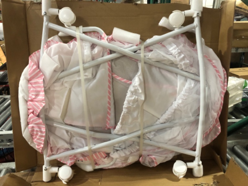 Photo 3 of Dream On Me Lacy Portable 2-in-1 Bassinet & Cradle in Pink and White