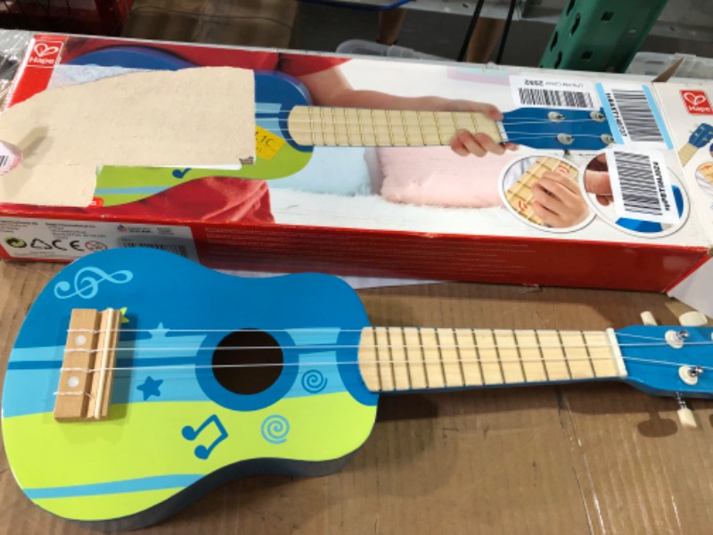 Photo 2 of Hape Kid's Wooden Toy Ukulele in Blue, L: 21.9 x W: 8.1 x H: 3 inch