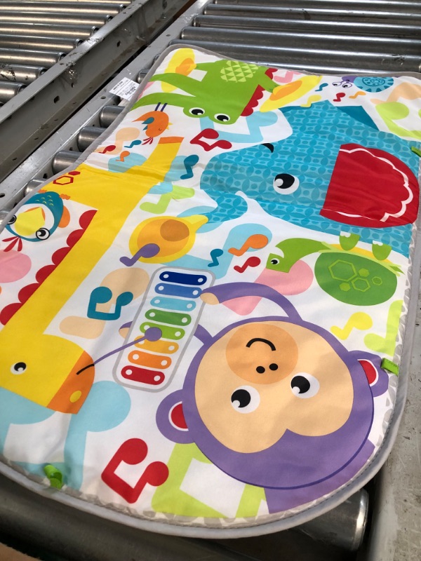 Photo 3 of Fisher-Price Baby Playmat Deluxe Kick & Play Piano Gym with Musical -Toy Lights & Smart Stages Learning Content for Newborn to Toddler