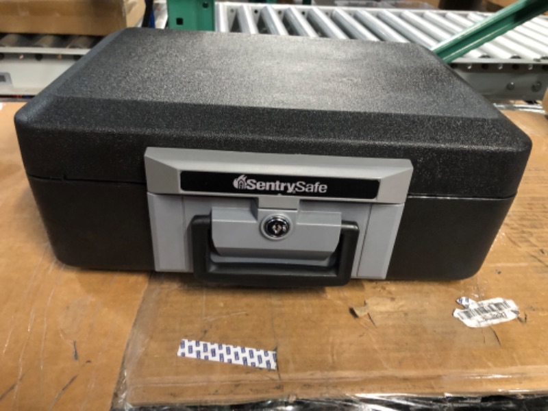 Photo 1 of *USED* SentrySafe Fireproof Safe Box with Key Lock, Chest Safe with Carrying Handle to Secure Valuables and Jewelry, 6.3 x 15.3 x 12.1 Inches