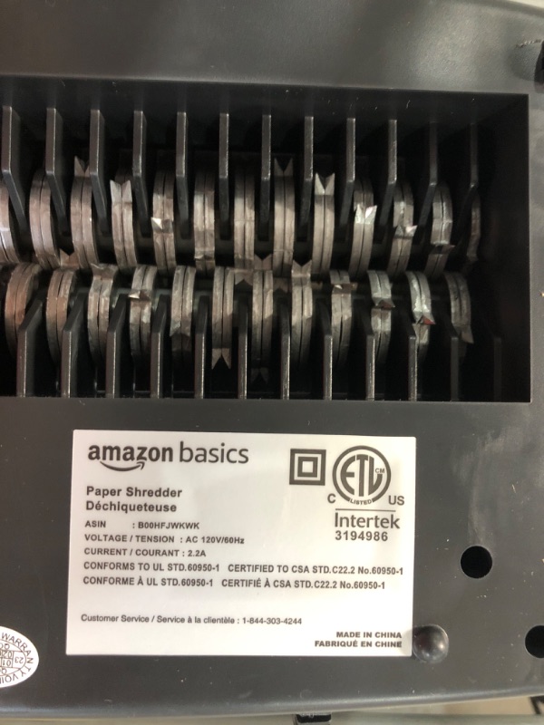 Photo 2 of USED - AMAZON BASICS PAPER SHREDDER 