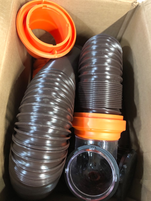 Photo 2 of Camco RhinoFLEX RV Sewer Hose Kit with Swivel Transparent Elbow and 4-in-1 Dump Station Fitting, Brown, 15 Feet (39770) 15ft Sewer Hose Kit Frustration-Free Packaging