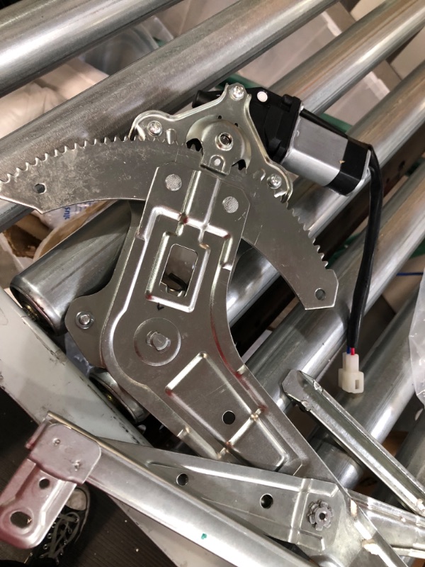 Photo 1 of Front Driver Side Power Window Motor and Regulator Assembly Replacement