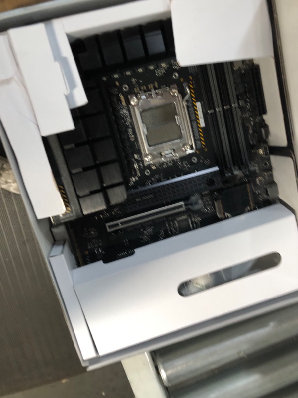 Photo 2 of ASUS TUF Gaming B650-PLUS WiFi Socket AM5 (LGA 1718) Ryzen 7000 ATX Gaming Motherboard(14 Power Stages, PCIe® 5.0 M.2 Support, DDR5 Memory, 2.5 Gb Ethernet, WiFi 6, USB4® Support and Aura Sync)