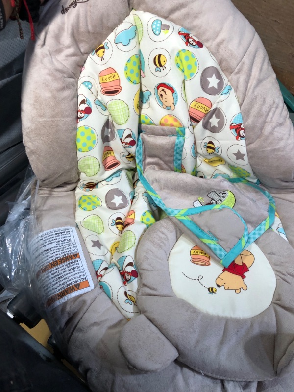 Photo 4 of Bright Starts Winnie the Pooh Dots & Hunny Pots Baby Bouncer with Vibrating Infant Seat, Music & 3 Playtime Toys, 23x19x23 Inch