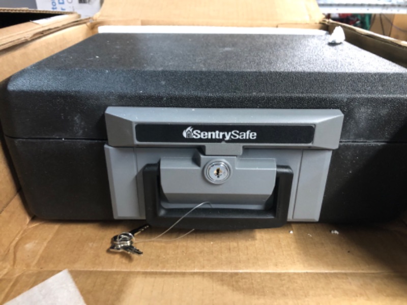 Photo 1 of SentrySafe Fireproof Safe Box with Key Lock, Chest Safe with Carrying Handle to Secure Valuables and Jewelry, 