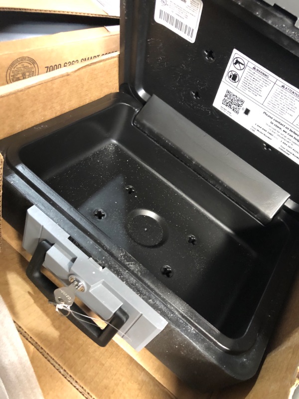 Photo 1 of SentrySafe Fireproof Safe Box with Key Lock, Chest Safe with Carrying Handle to Secure Valuables and Jewelry, 