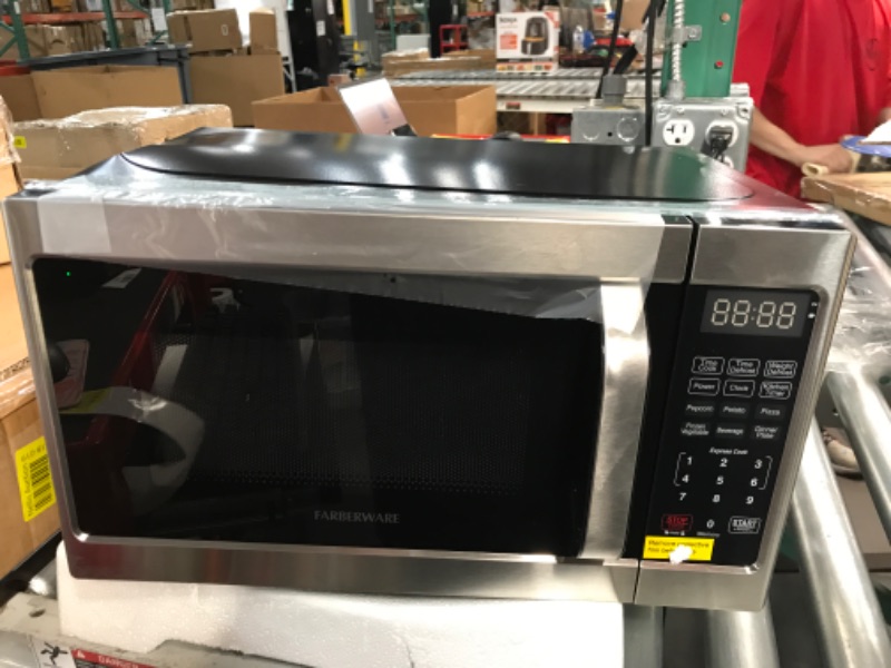 Photo 1 of *LIKE NEW*Farberware Classic FMO07AHTBKJ 0.7 Cu. Ft. 700-Watt Microwave Oven with LED Lighting, Brushed Stainless Steel 0.7 Cu.Ft. Microwave Oven