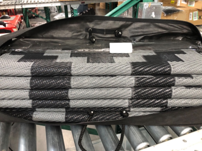 Photo 1 of *USED* SAND MINE Reversible Mats, Plastic Straw Rug,  (9' x 12', Black Grey Lattice)