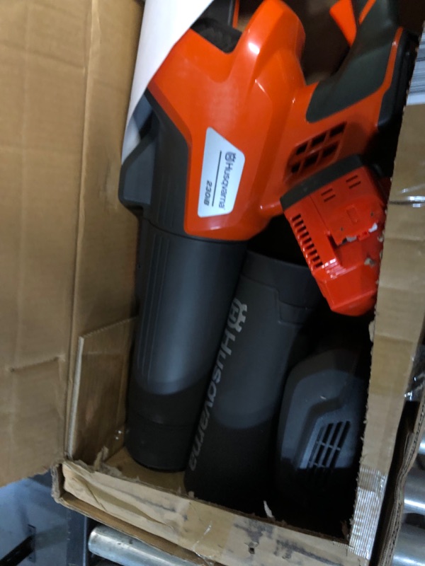 Photo 2 of Husqvarna 230iB Battery Powered Cordless Leaf Blower, 136-MPH 650-CFM Electric Leaf Blower with Brushless Motor and Quiet Operation, 40V Lithium-Ion Battery and Charger Included